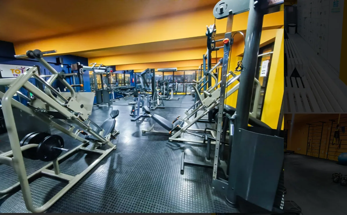 Área de leg press, armários e espaço funcional